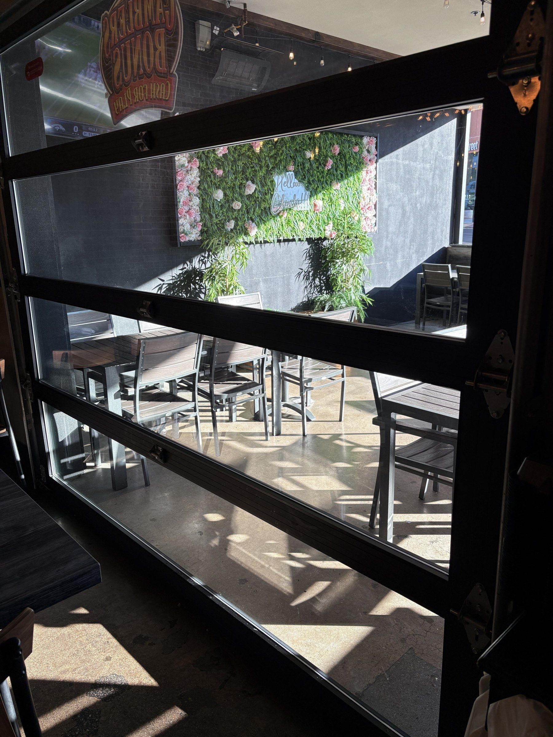Freshly cleaned storefront glass doors looking onto a restaurant patio in the Las Vegas Valley